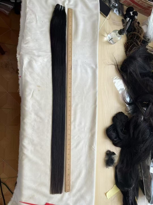 son şirket davası hakkında 38 inç 40 inç Doğal Siyah Düz Bakire İnsan Saçları